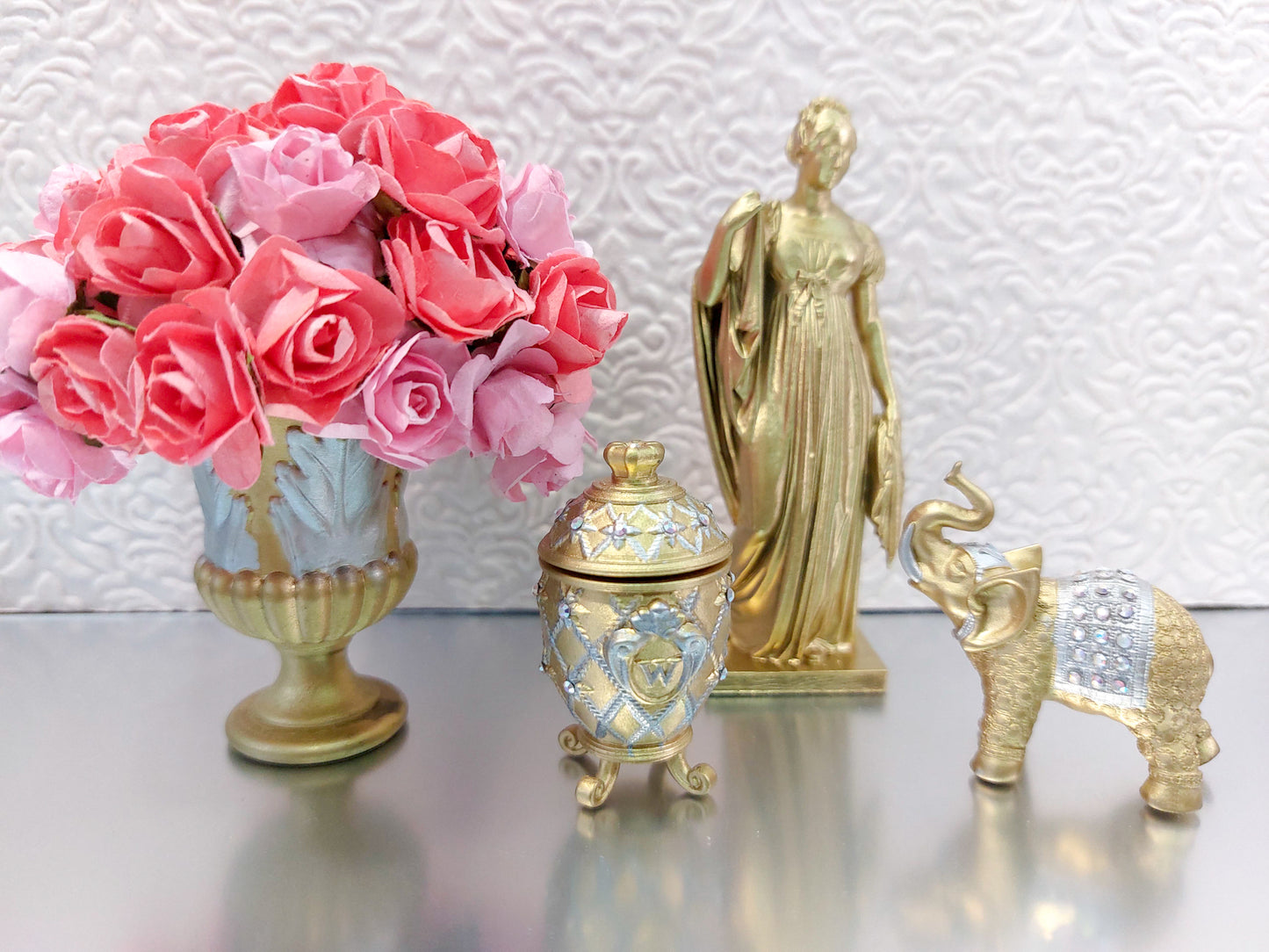Miniature decorative set – golden figurine, flower vase, elephant, Faberge egg – 4 pcs
