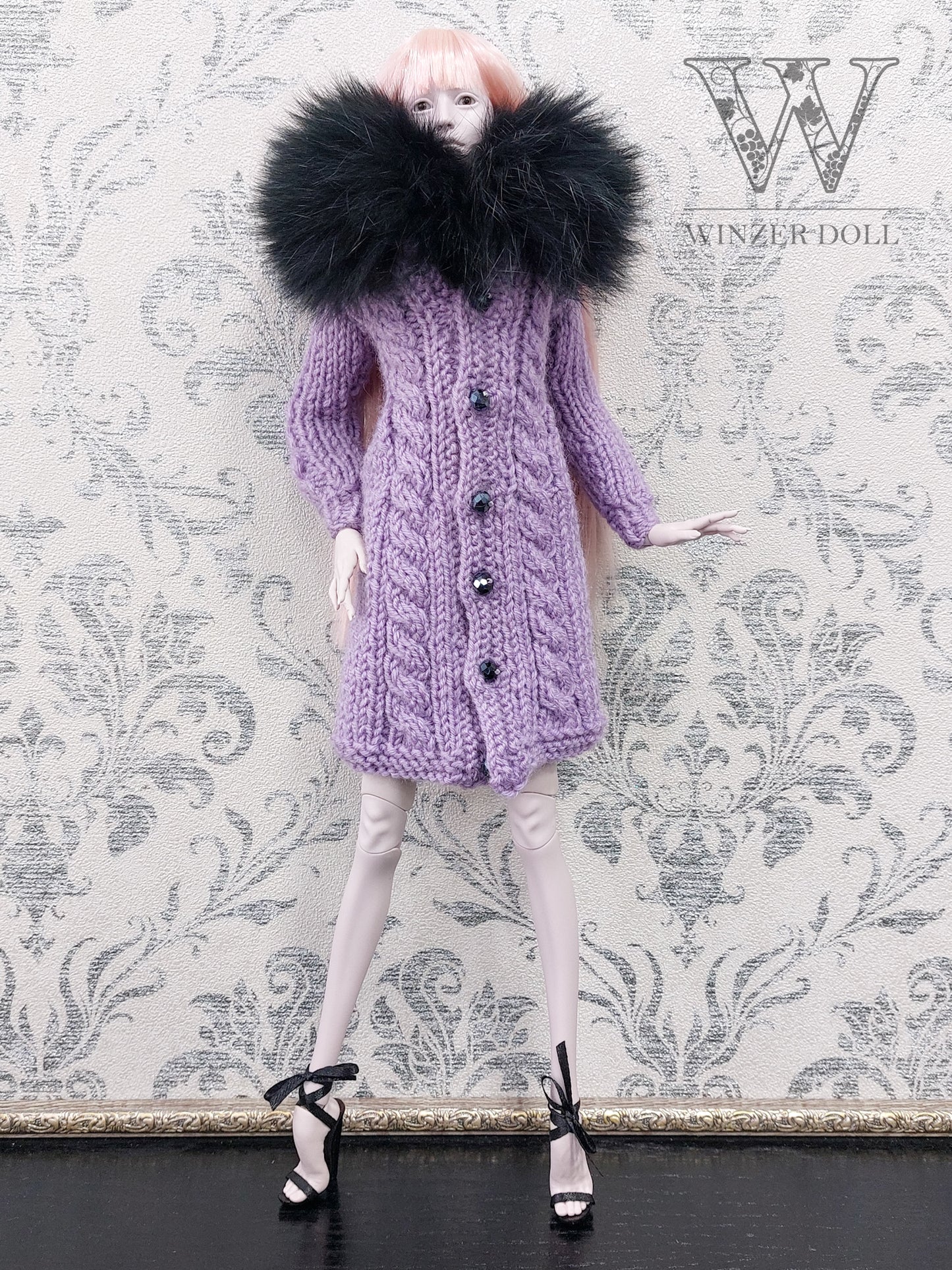 Knitted coat with a collar made of natural fur, purple