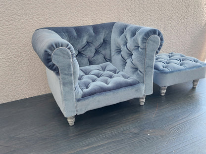 Chesterfield armchair with ottoman, blue gray velvet